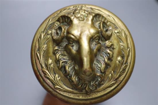 A 19th century brass rams mask door handle, depth 18cm